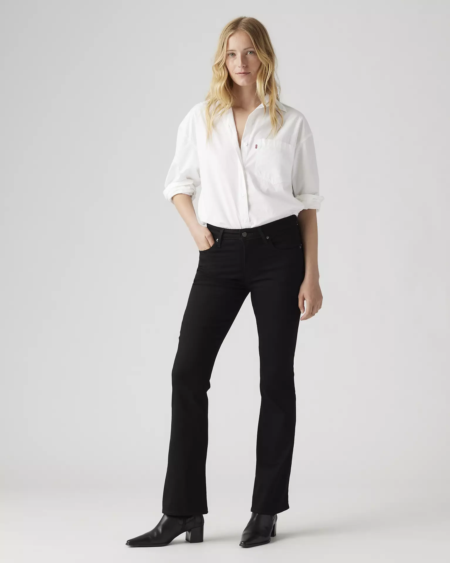 Levi’s 725 High Rise Bootcut Jeans shown on model in black denim
