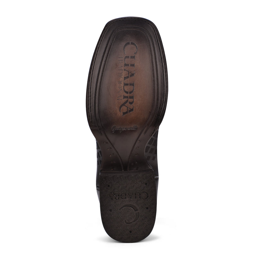 Bota vaquera de cuero negro grabado