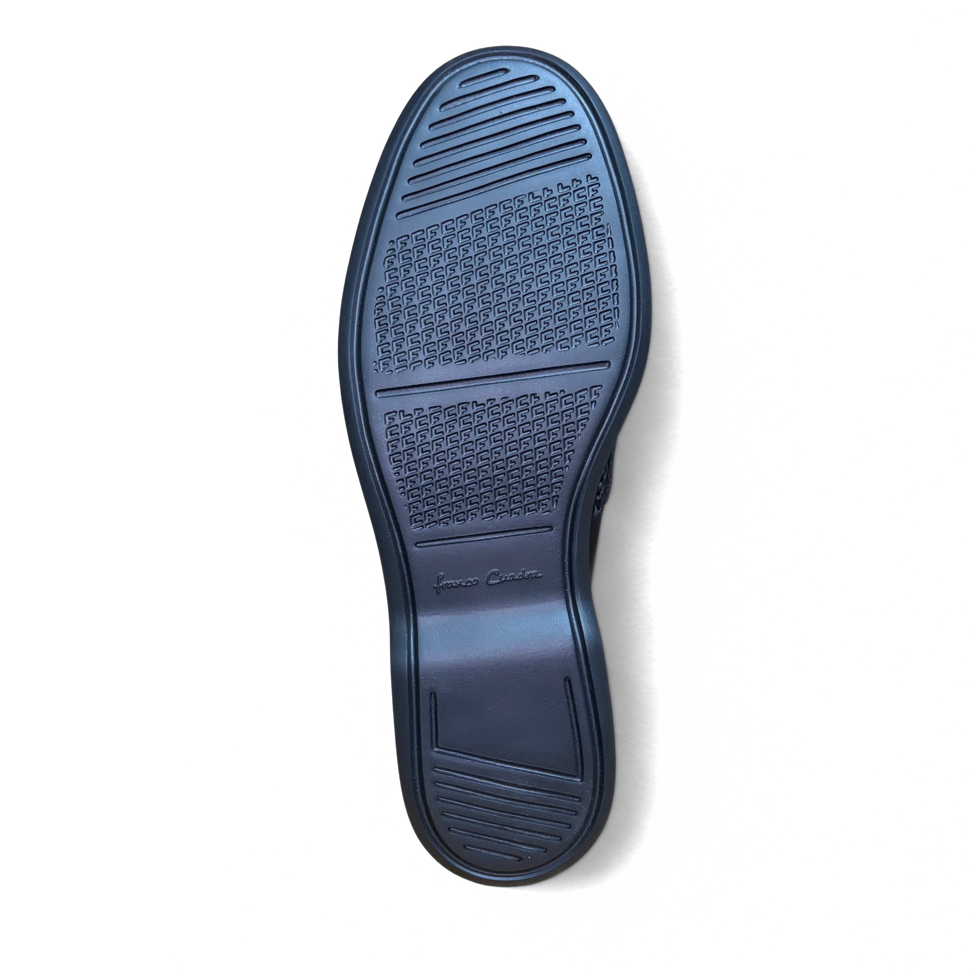 Outsole view of Cuadra Men’s Black Caiman Slip-On Round Toe Loafer showing tread