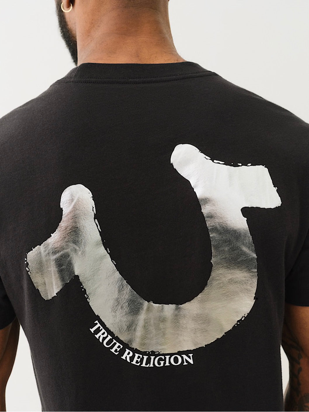 Camiseta de herradura diagonal