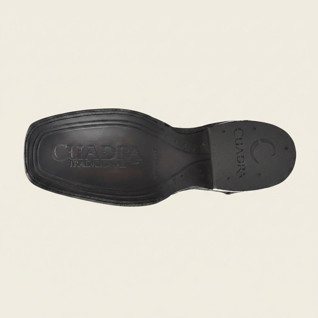 Outsole view of Cuadra Engraved Cayman Western Boot showing tread detail