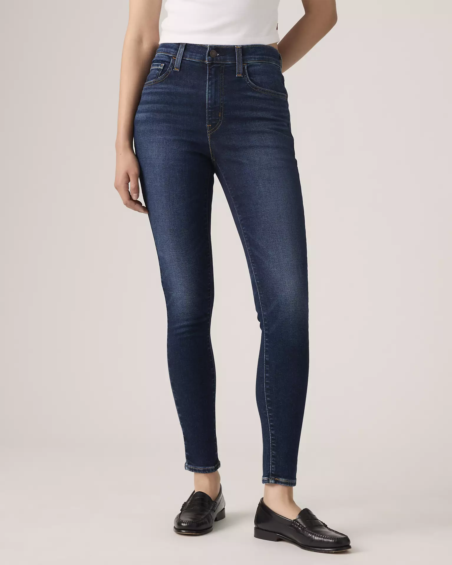 Close-up of lower leg and ankle fit on Levi’s 720 High Rise Super Skinny Women’s Jeans