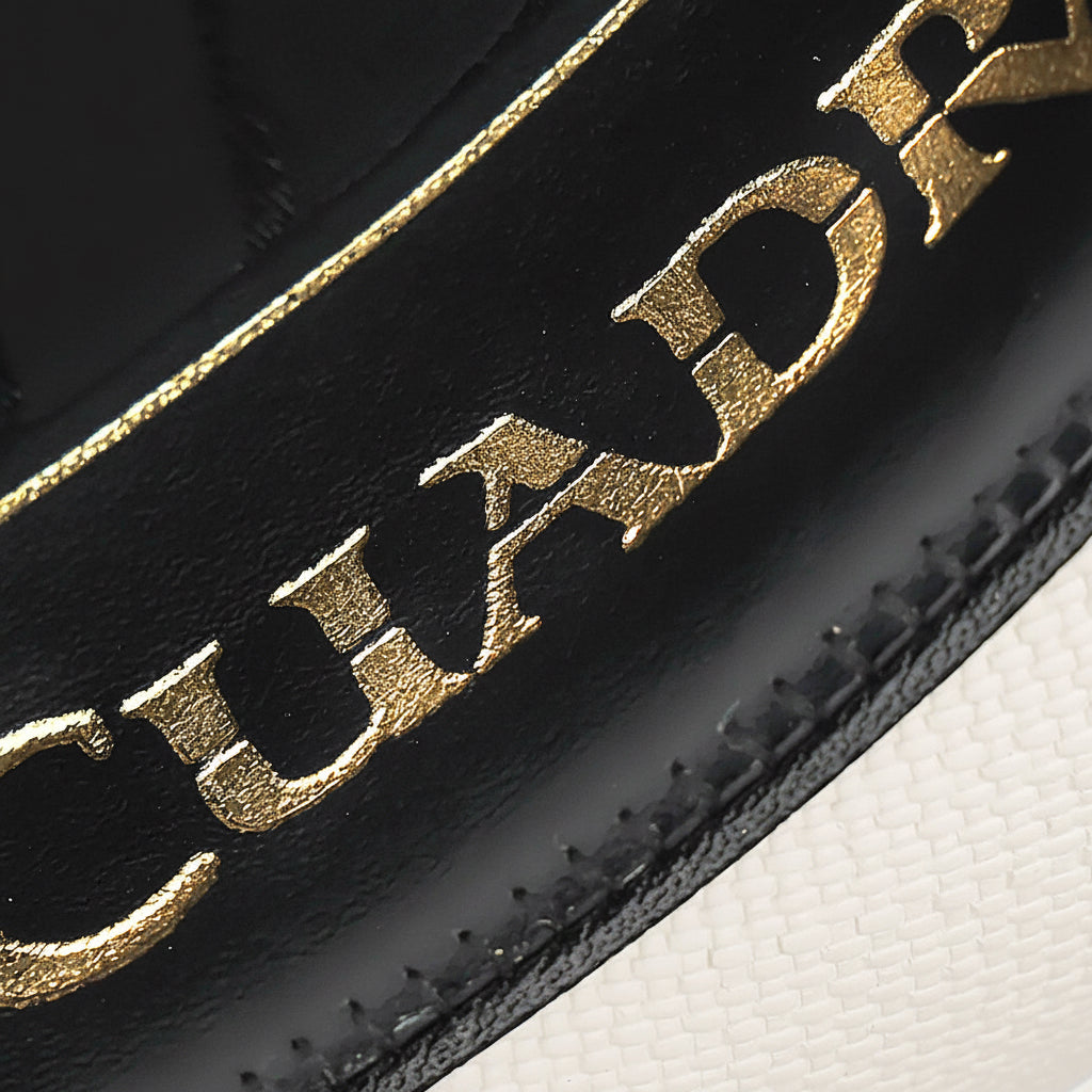 Close-up of Cuadra inside gold logo detail on Ivory 100X Handmade Cayman Hat