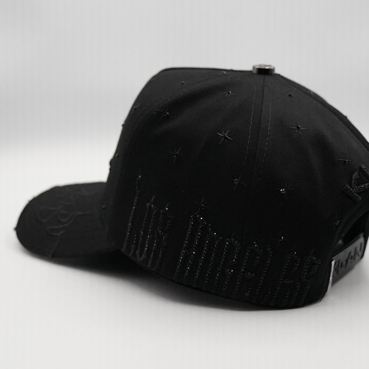 Side profile of Bigg Boss LA Flame Black Klan Hat