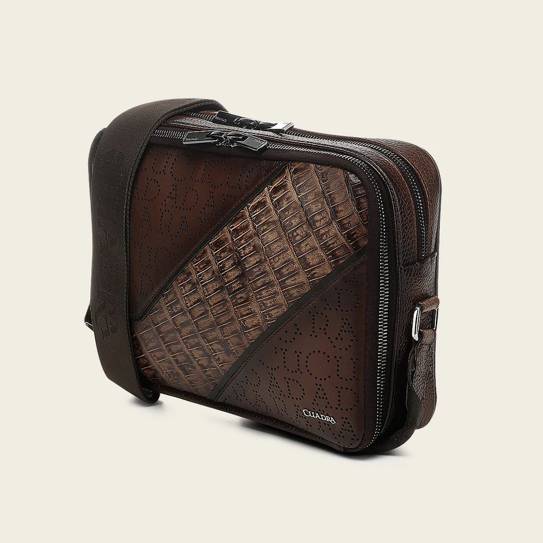 Angled side view of Cuadra Brown Caiman Zipper Bag showing textured leather detail
