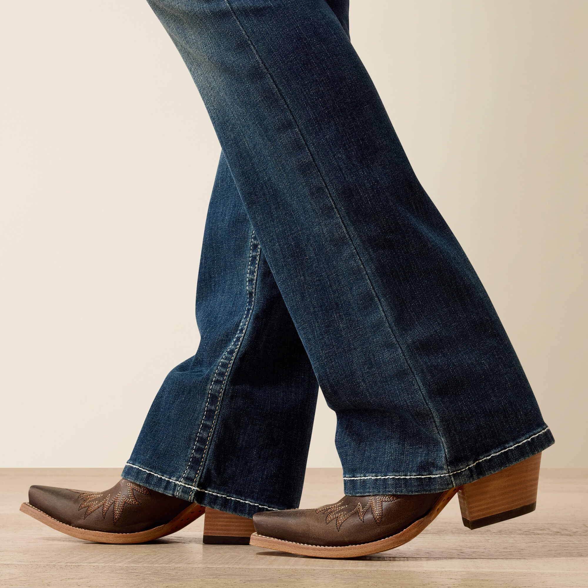 Mid Rise Whipstitch Boot Cut Jeans