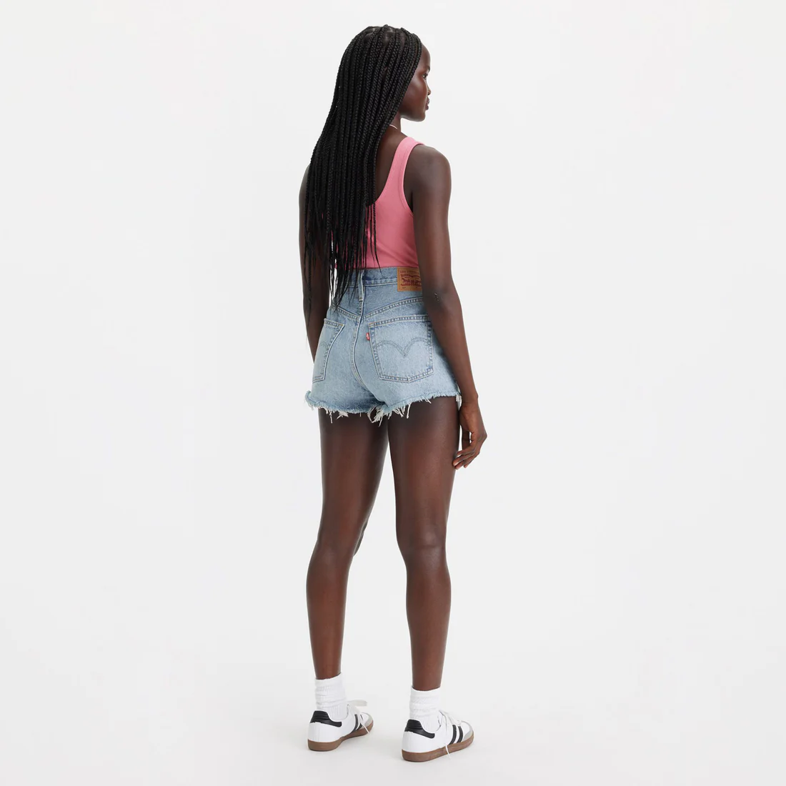 Back view of Levi’s 501 High Rise Frayed Hem Cut Off Shorts on model