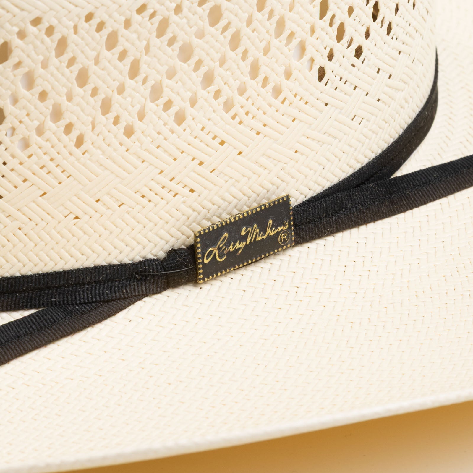 Close-up of woven straw and hatband detail on Larry Mahan 10X Cowboy Weston Straw Hat