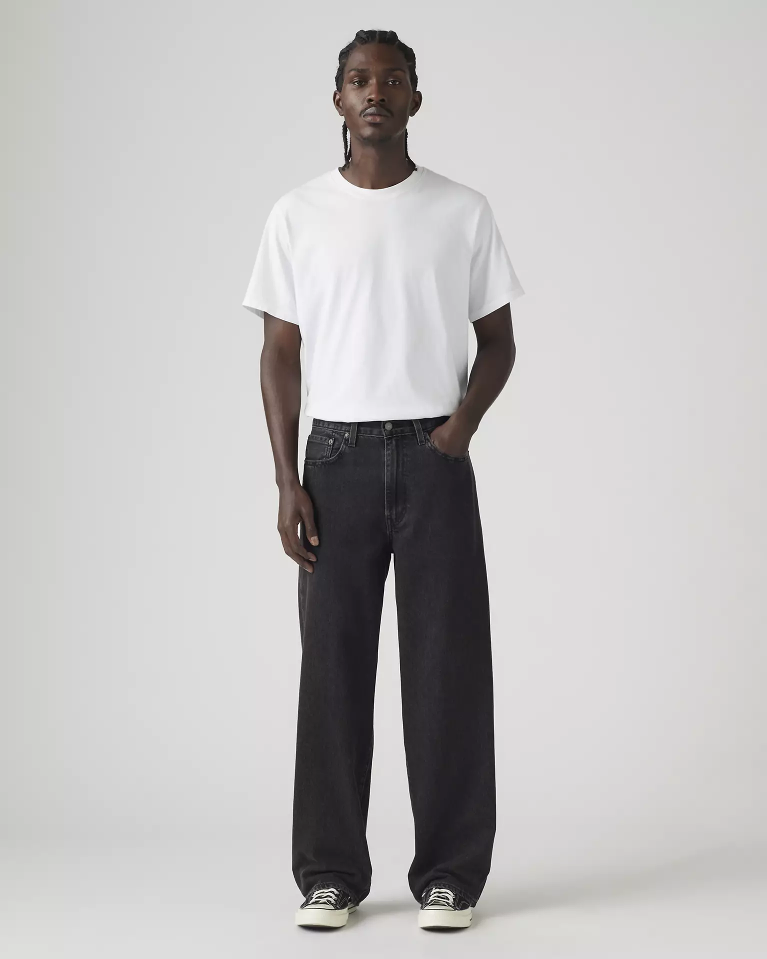 Front view of Levi’s 578 Baggy Men’s Jeans shown on model with white shirt