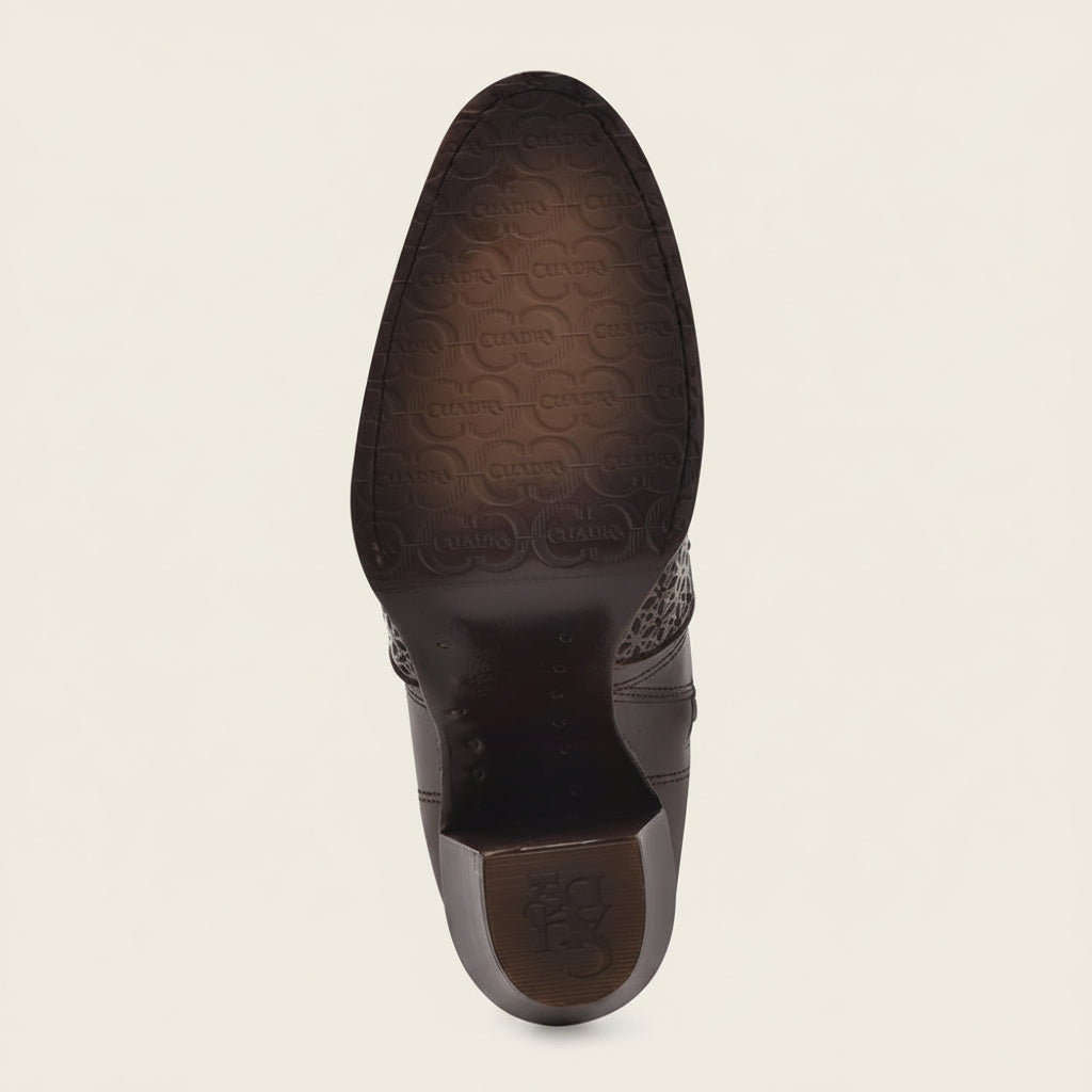 Outsole view of Cuadra Honey Perforated Crystal Ankle Bootie