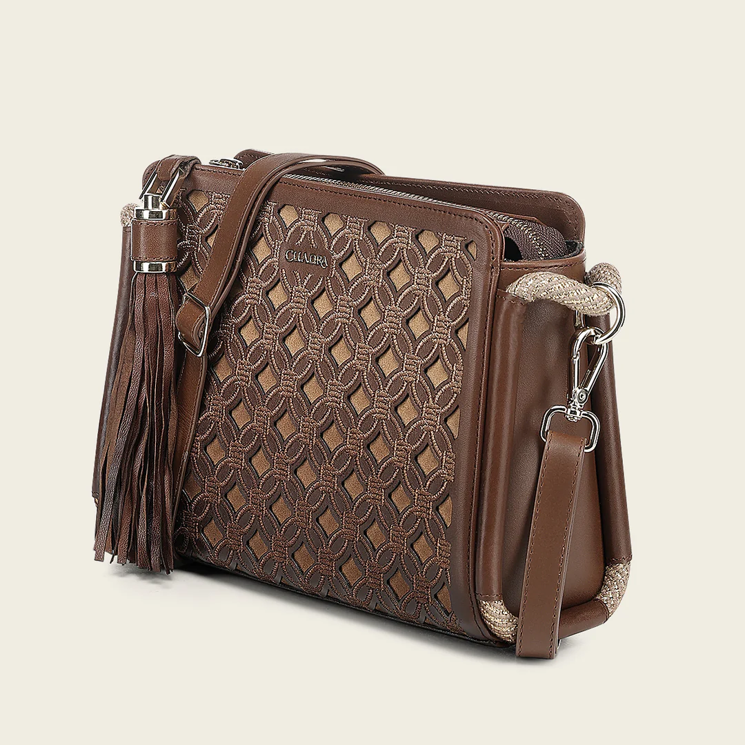Angled side view of Cuadra Honey Embroidery Bag in brown leather