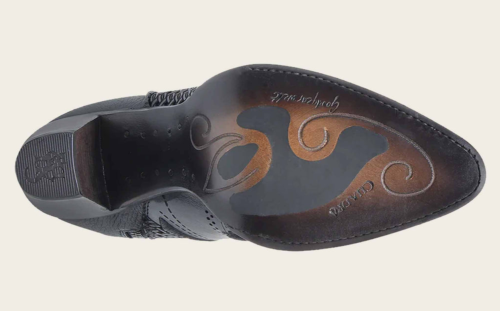 Botín Oxford de punta redonda con láser, bordado, tachuelas y cremallera