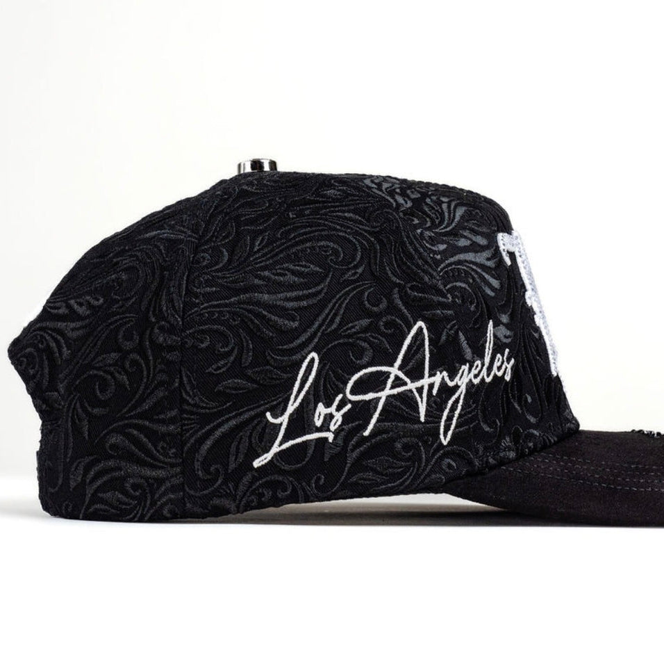 Side profile of Bigg Boss California Black White Hat showing embroidered detail