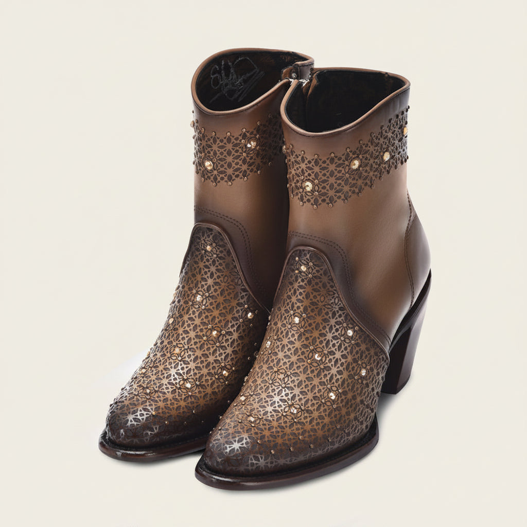 Pair of Cuadra Honey Perforated Crystal Ankle Booties in brown leather