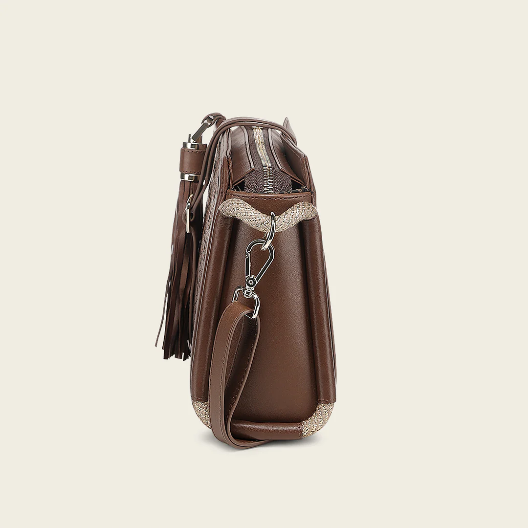 Side profile of Cuadra Honey Embroidery Bag showing fringe and strap detail