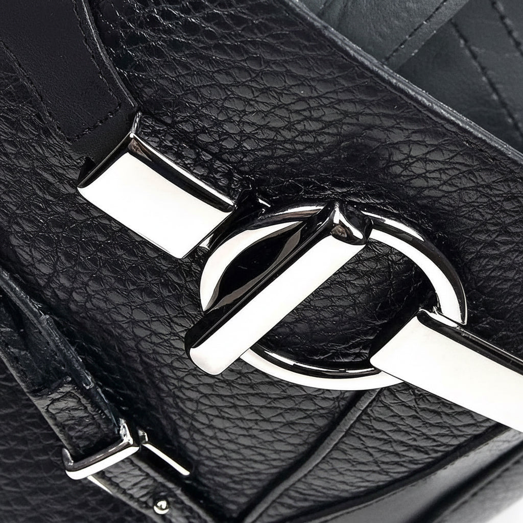 Close-up of buckle and leather detail on Cuadra Black Deer Ankle Bootie