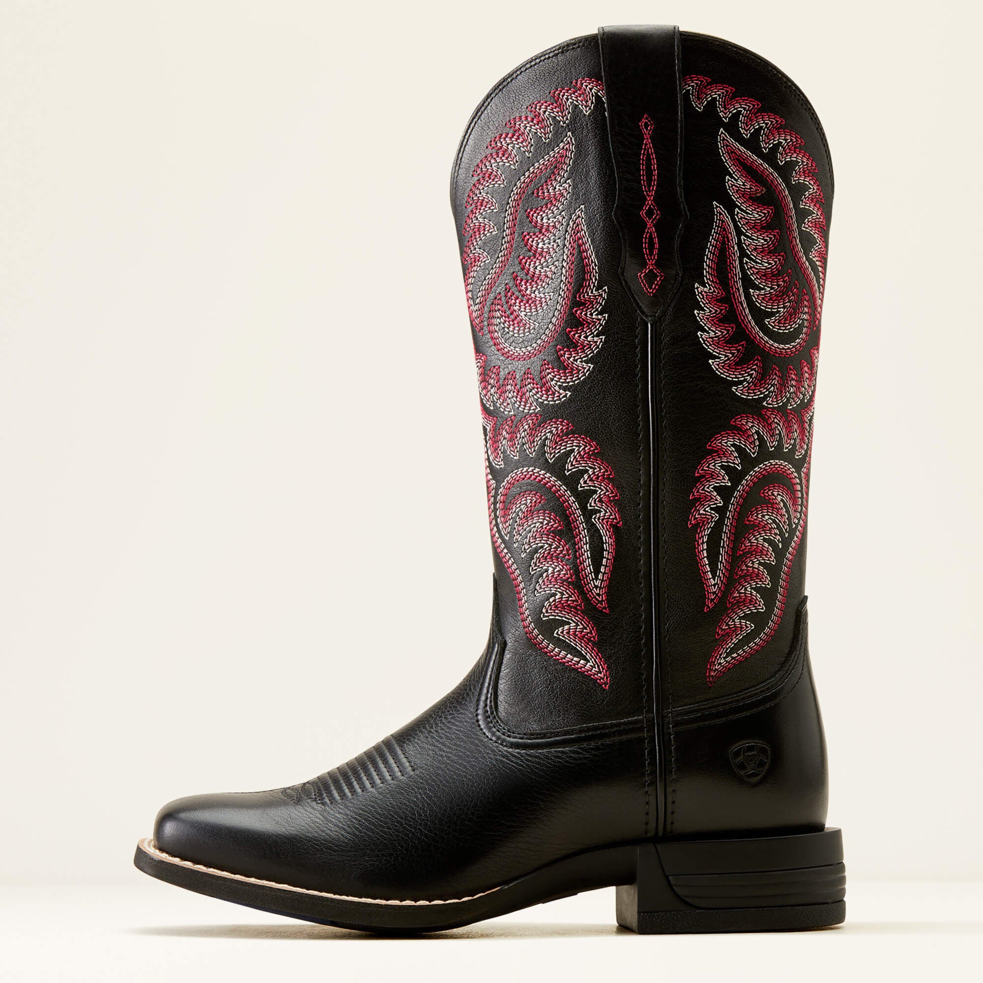 Side view of Ariat Cattle Caite Stretchfit Western Boot in black and pink
