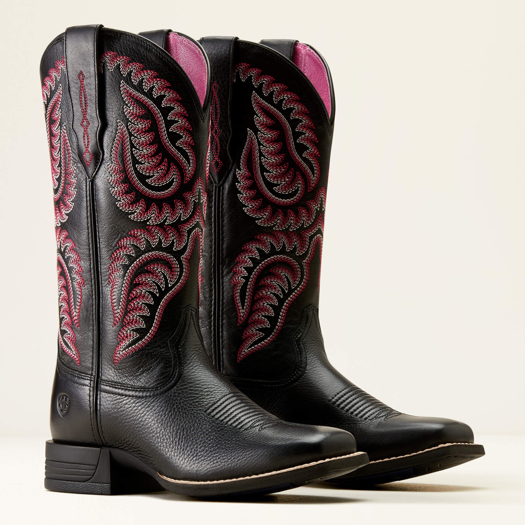 Pair of Ariat Cattle Caite Stretchfit Western Boots in black and pink