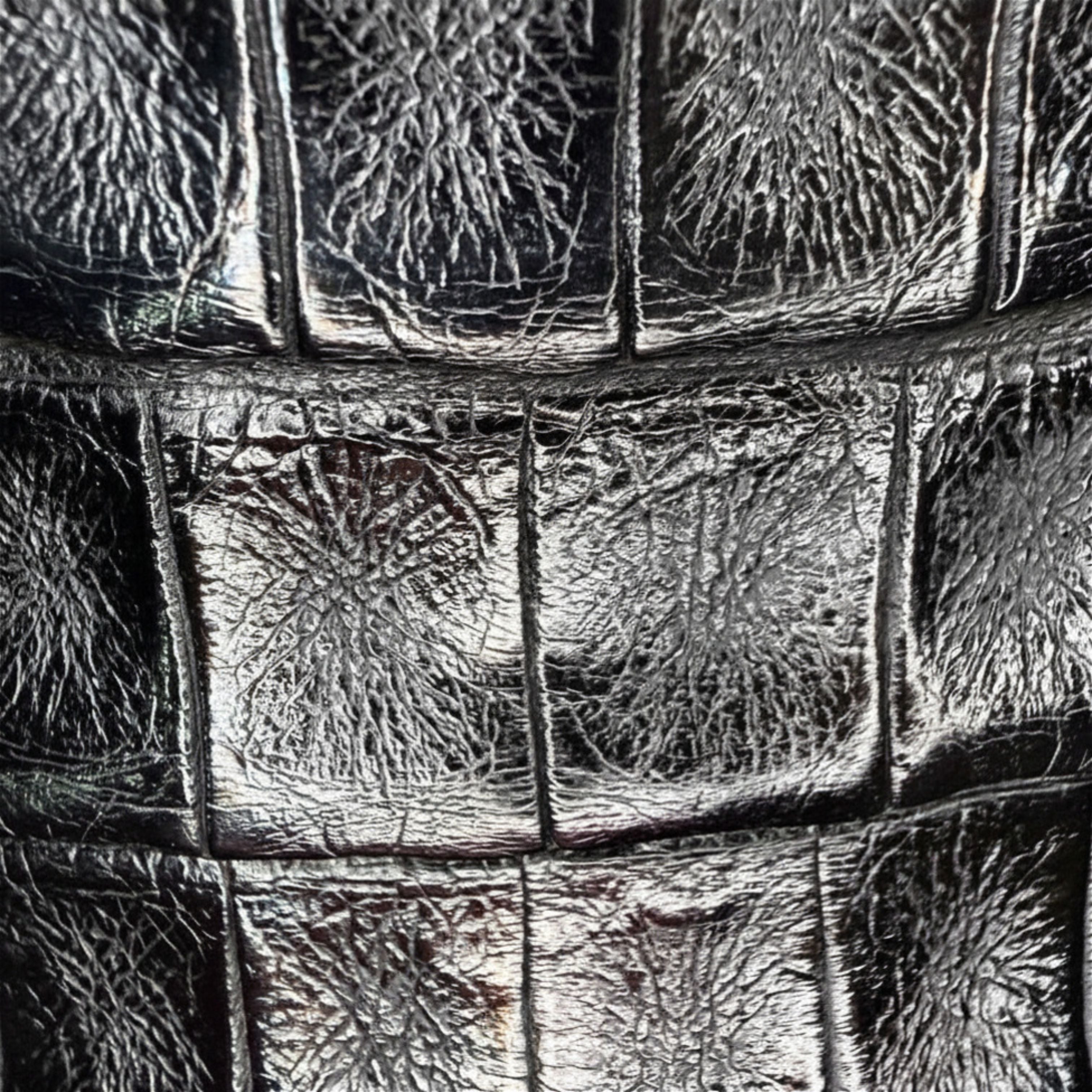 Close-up of side emblem detail on Vestigium Black Caiman Belly Boot