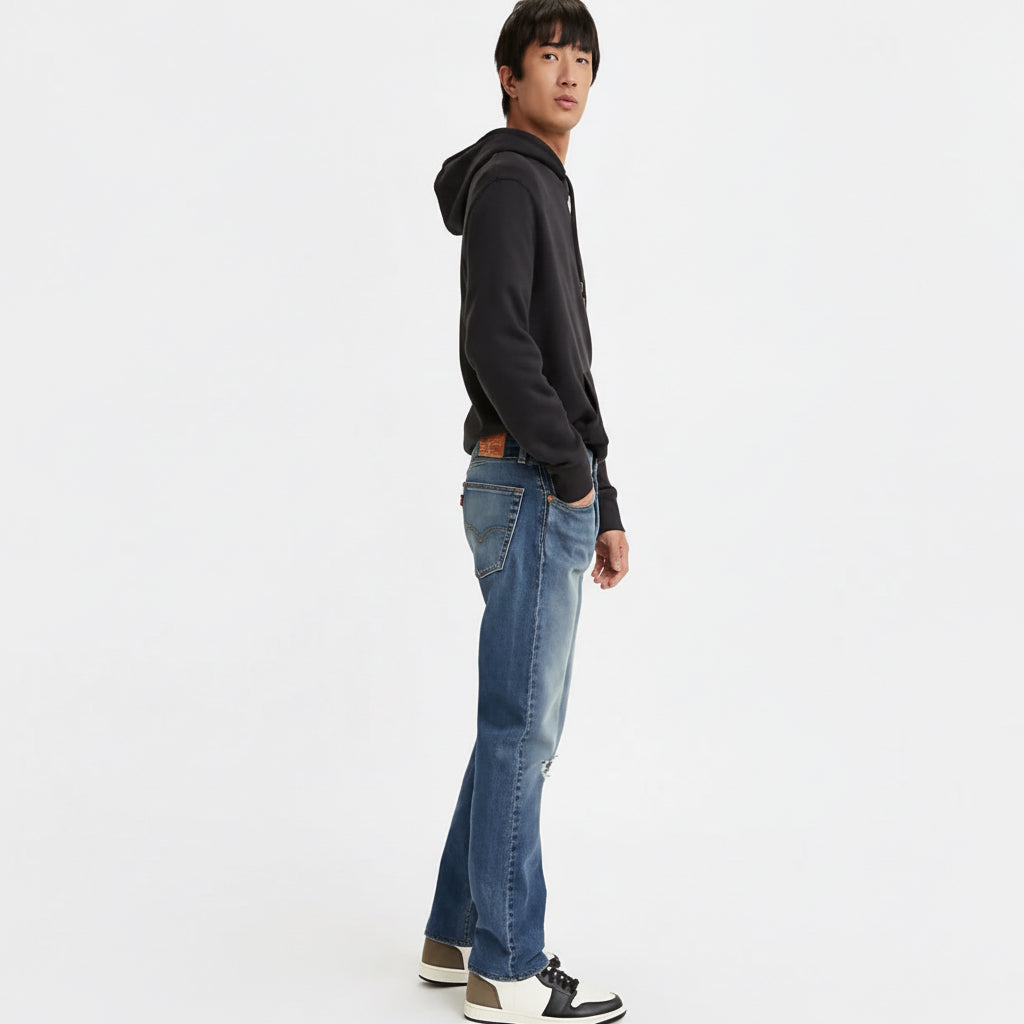 Side view of Levi’s 501 ’93 Straight Fit Jean in blue denim